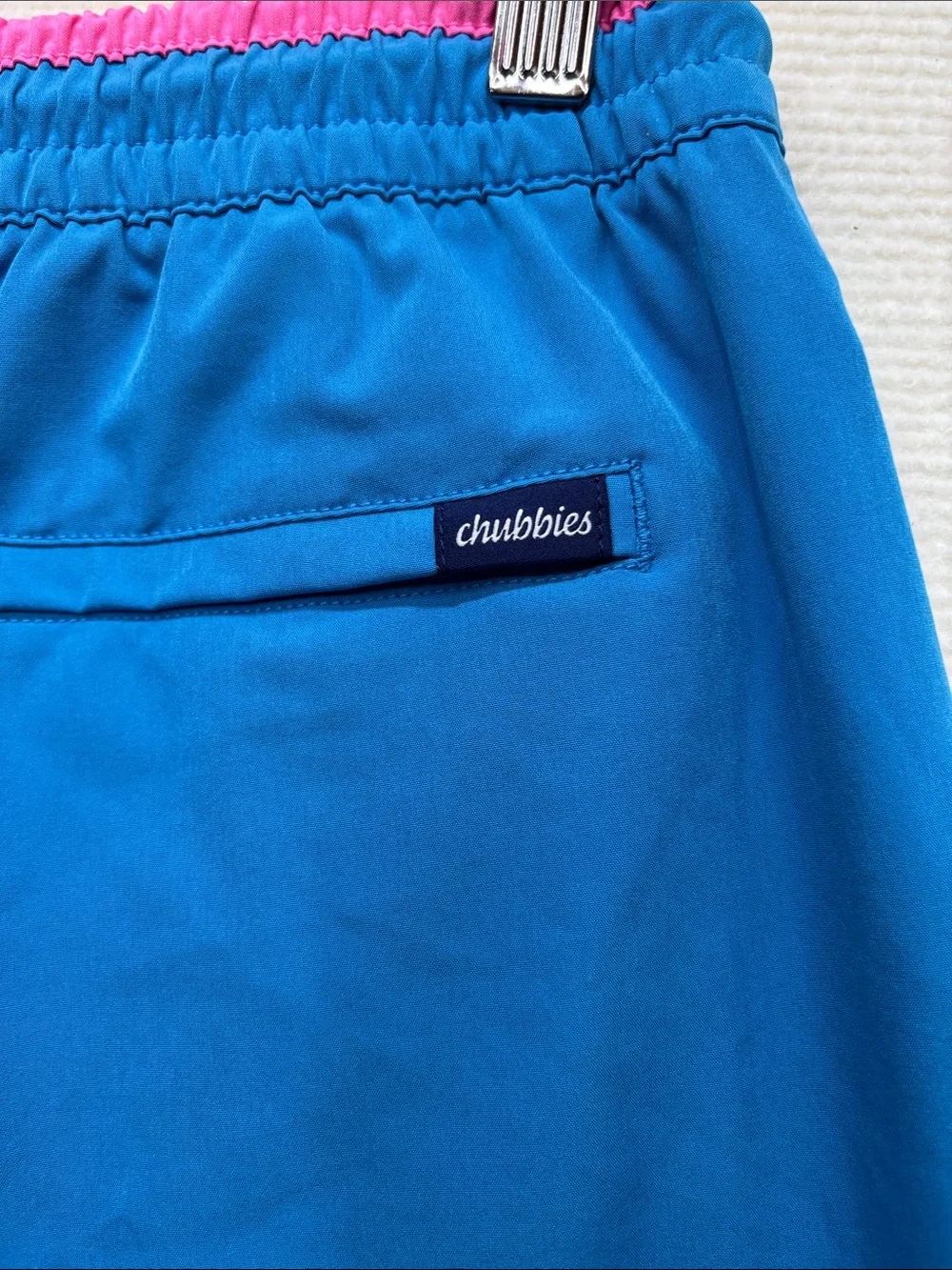 chubbies Bright Blue Swim Trunks with Pink Waistband